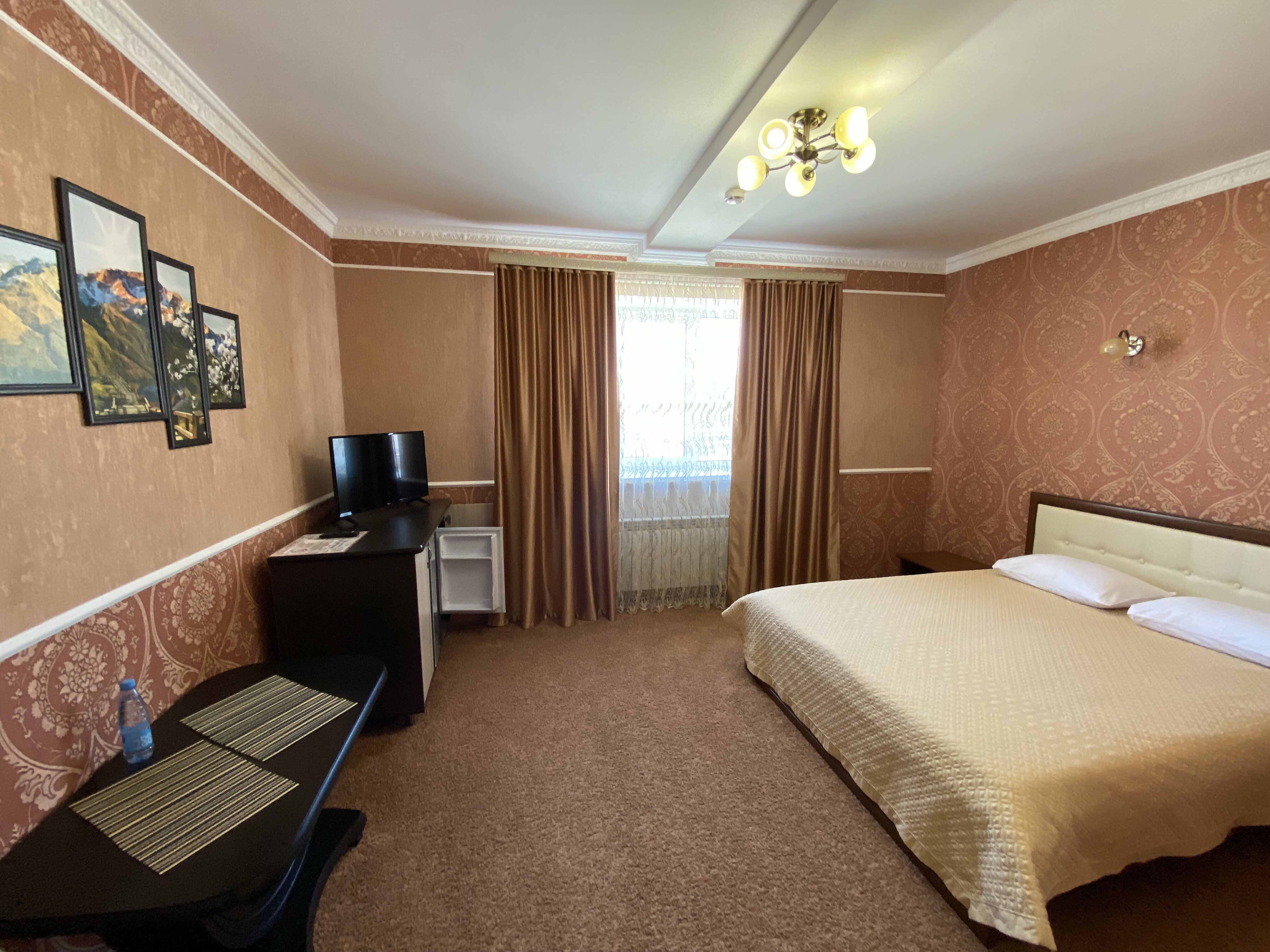 Улучшенный двухместный номер с 1 кроватью