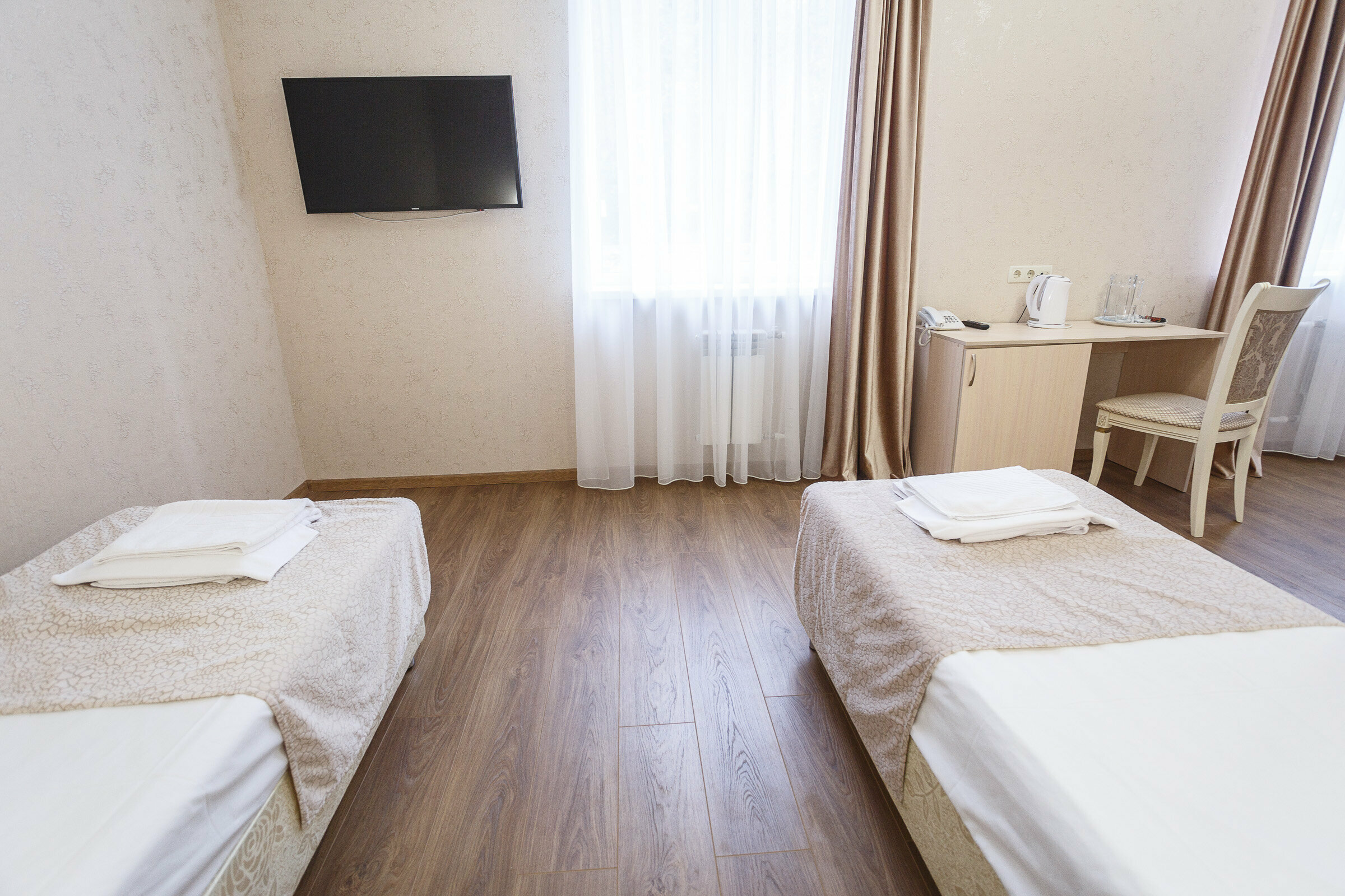 Двухместный номер с 2 отдельными кроватями и душем