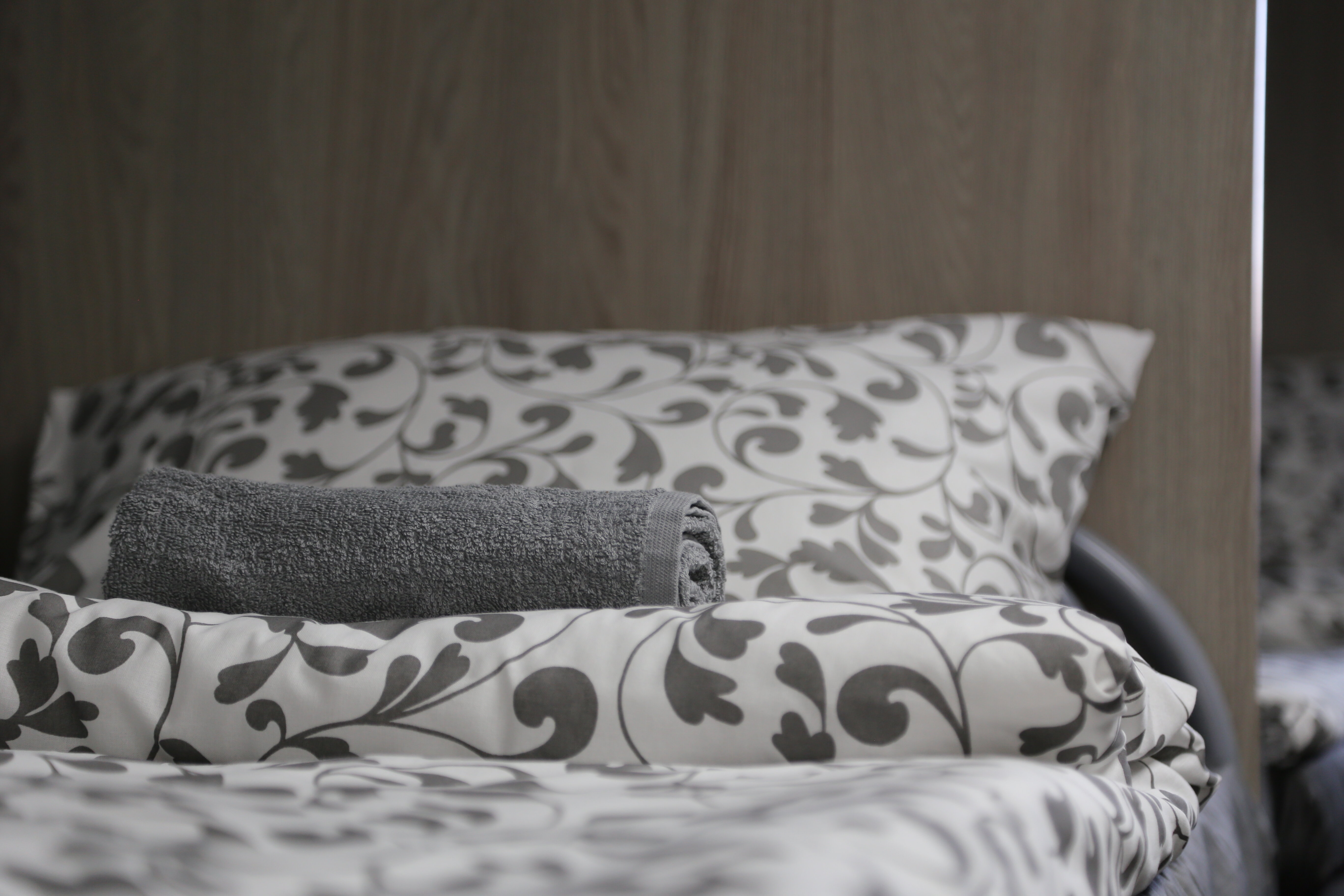 Спальное место на двухъярусной кровати в общем номере для мужчин