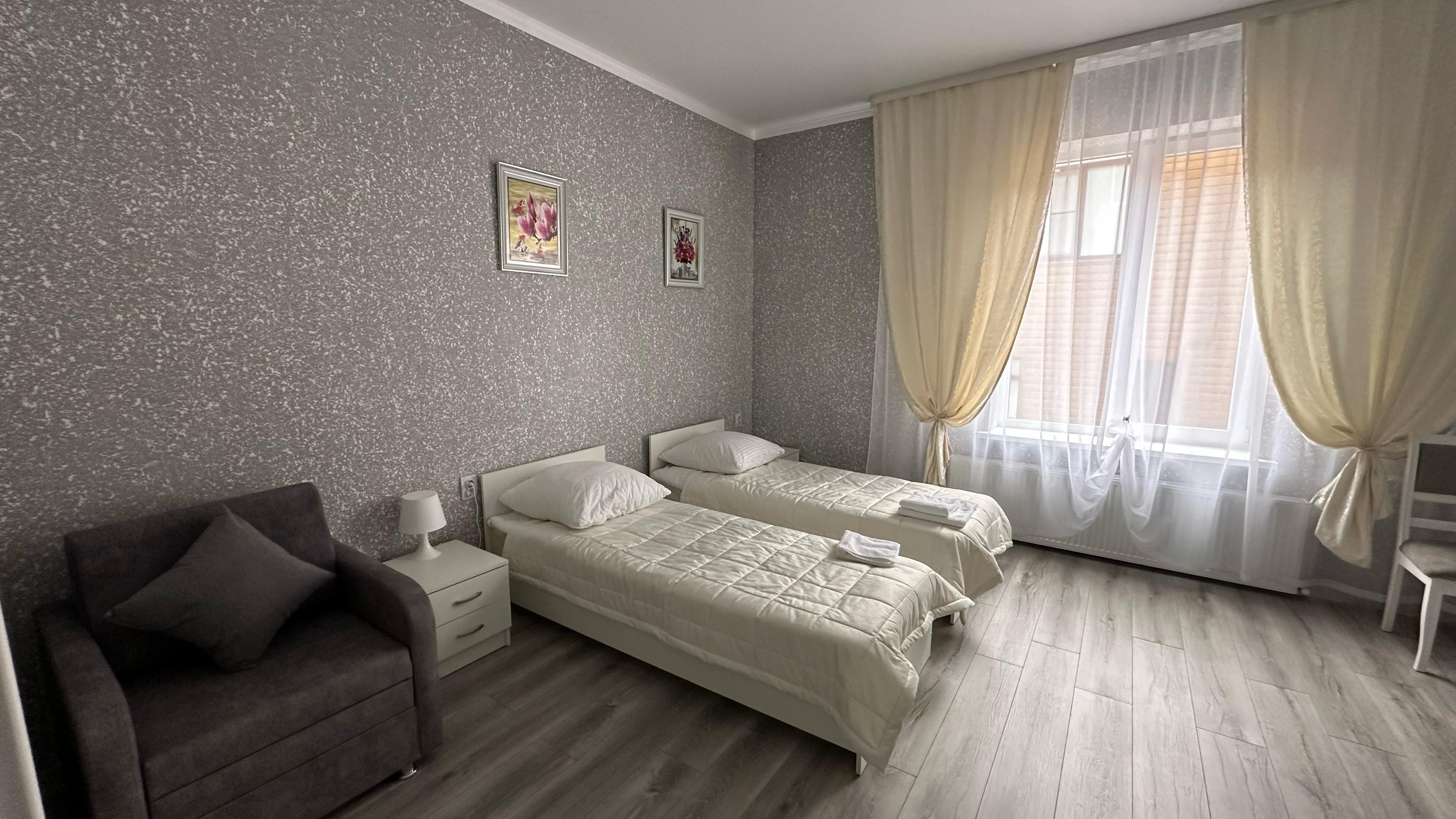 Трехместный номер Делюкс