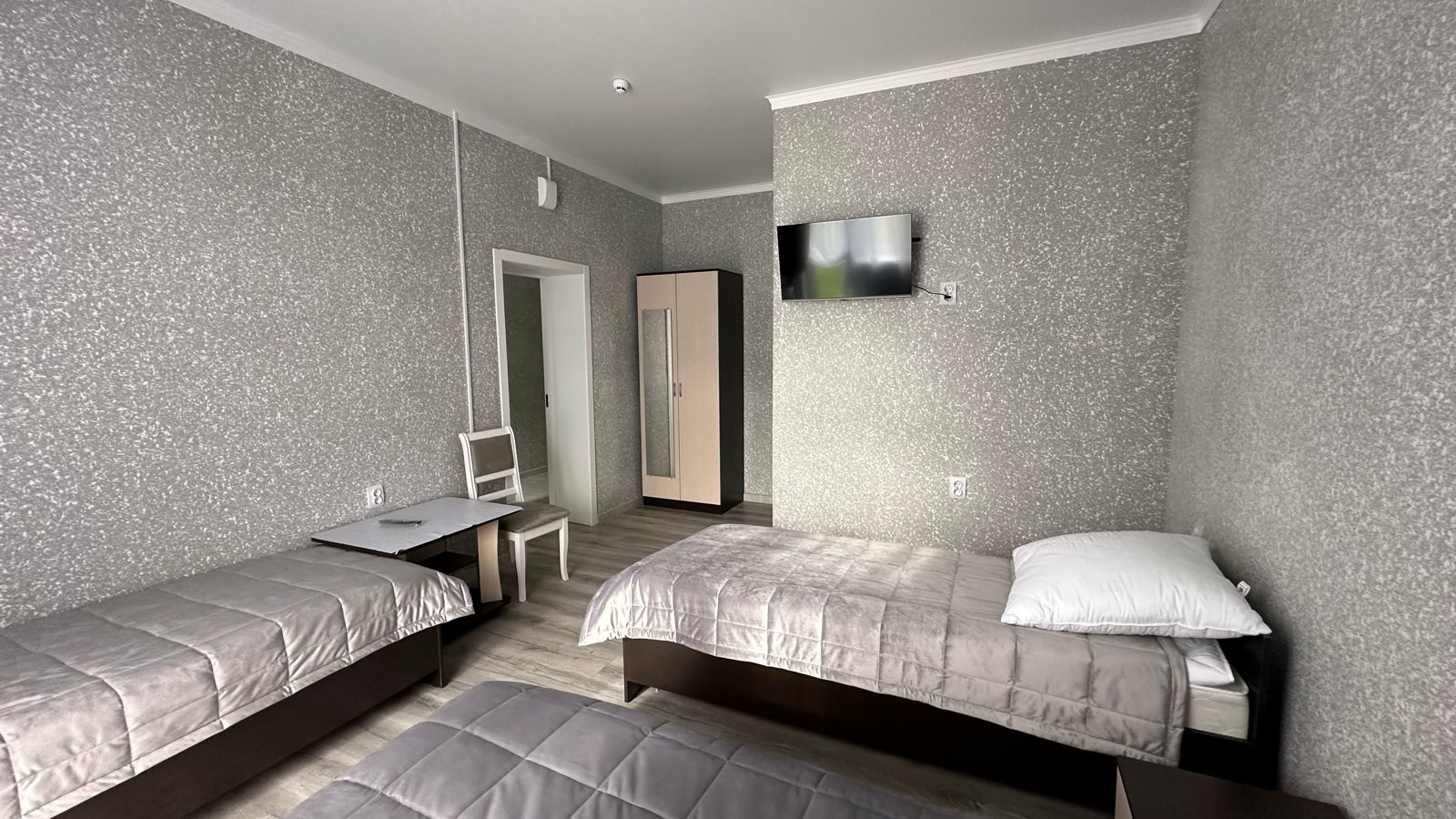 Трехместный номер Делюкс