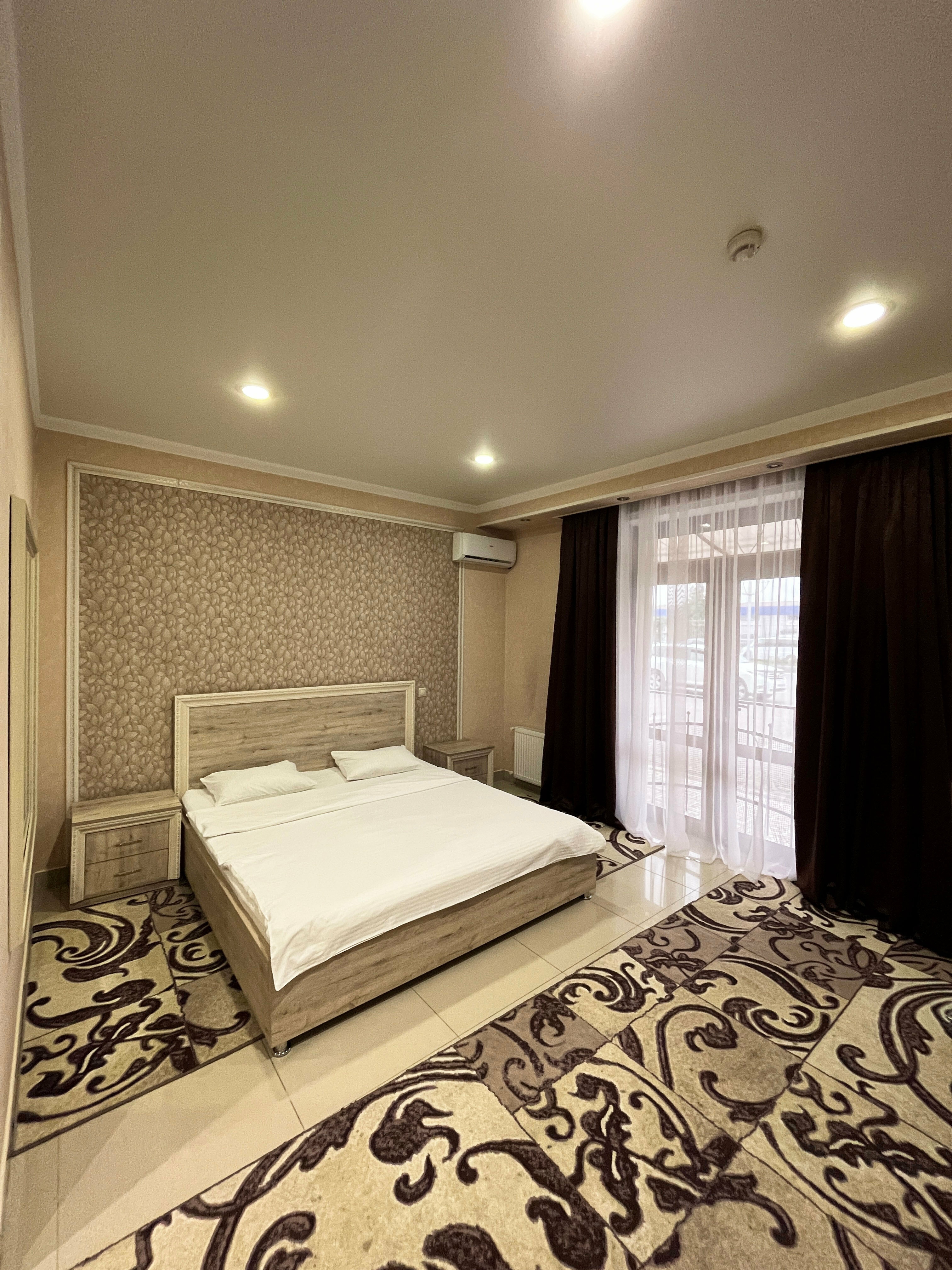 Улучшенный номер с кроватью размера «queen-size»