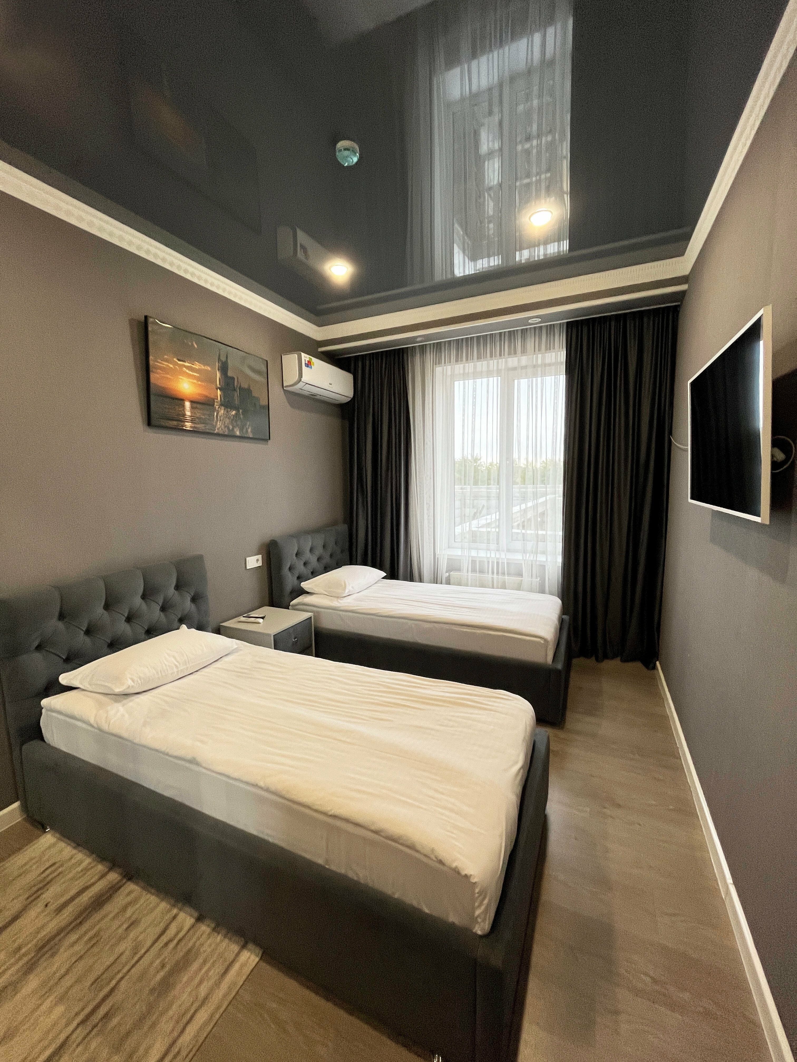 Улучшенный двухместный номер с 2 отдельными кроватями