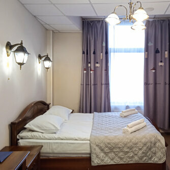 Улучшенный двухместный номер с 2 отдельными кроватями