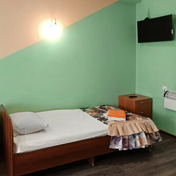 Четырехместный номер с общей ванной комнатой