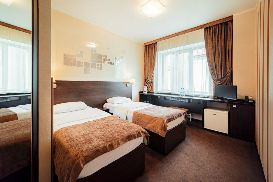 Стандартный двухместный номер с 2 односпальными кроватями