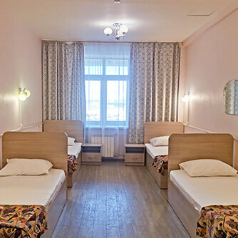 Четырехместный номер с общей ванной комнатой