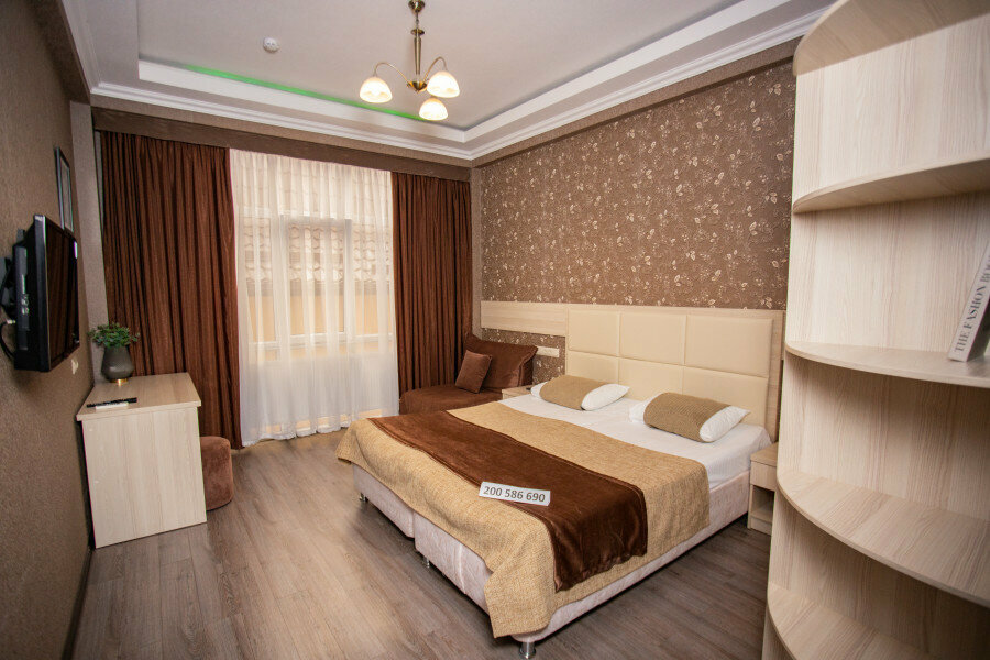 Трехместный номер с видом на город