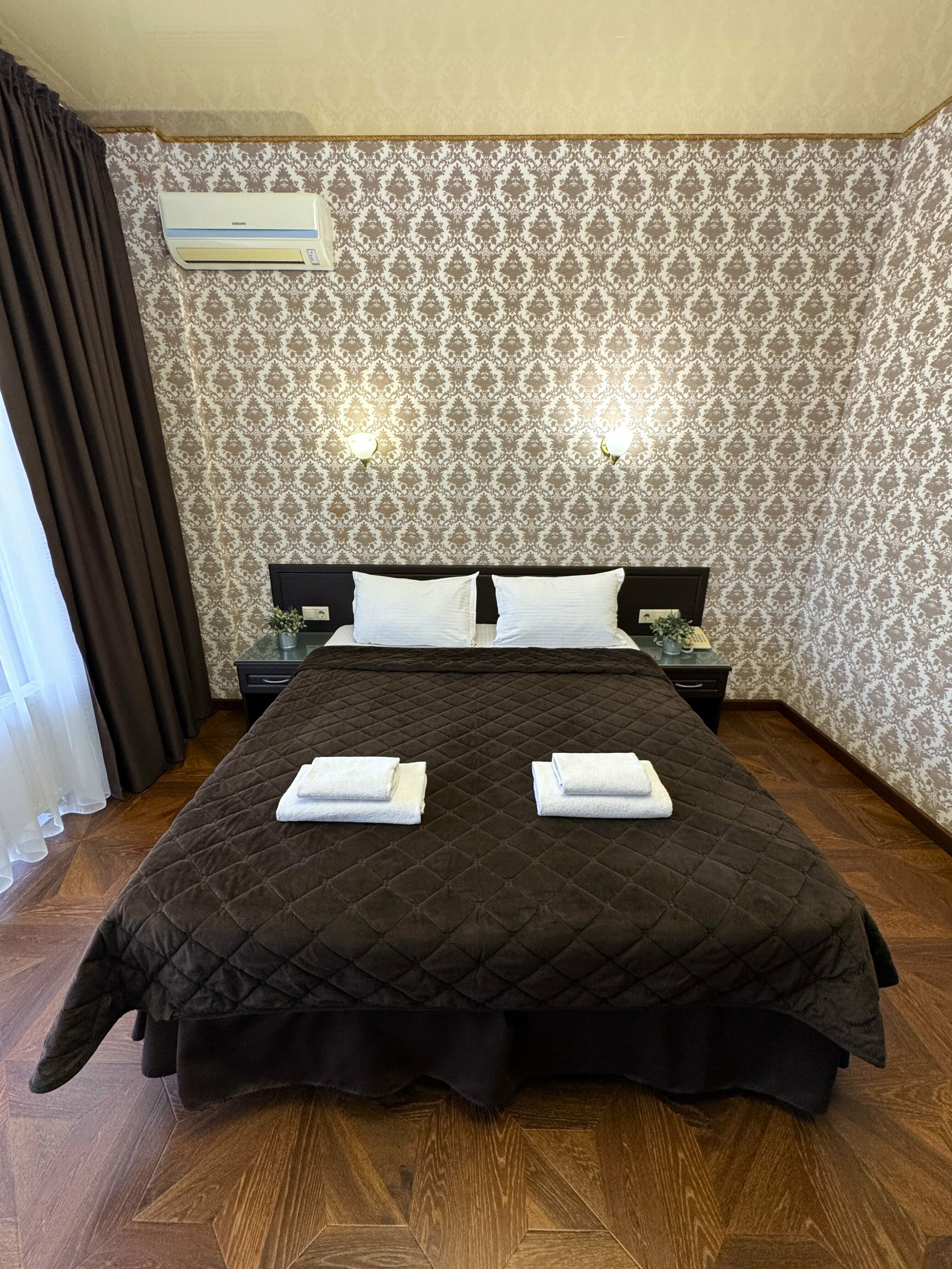 Deluxe двухместный с балконом, вид на город, с доп местом