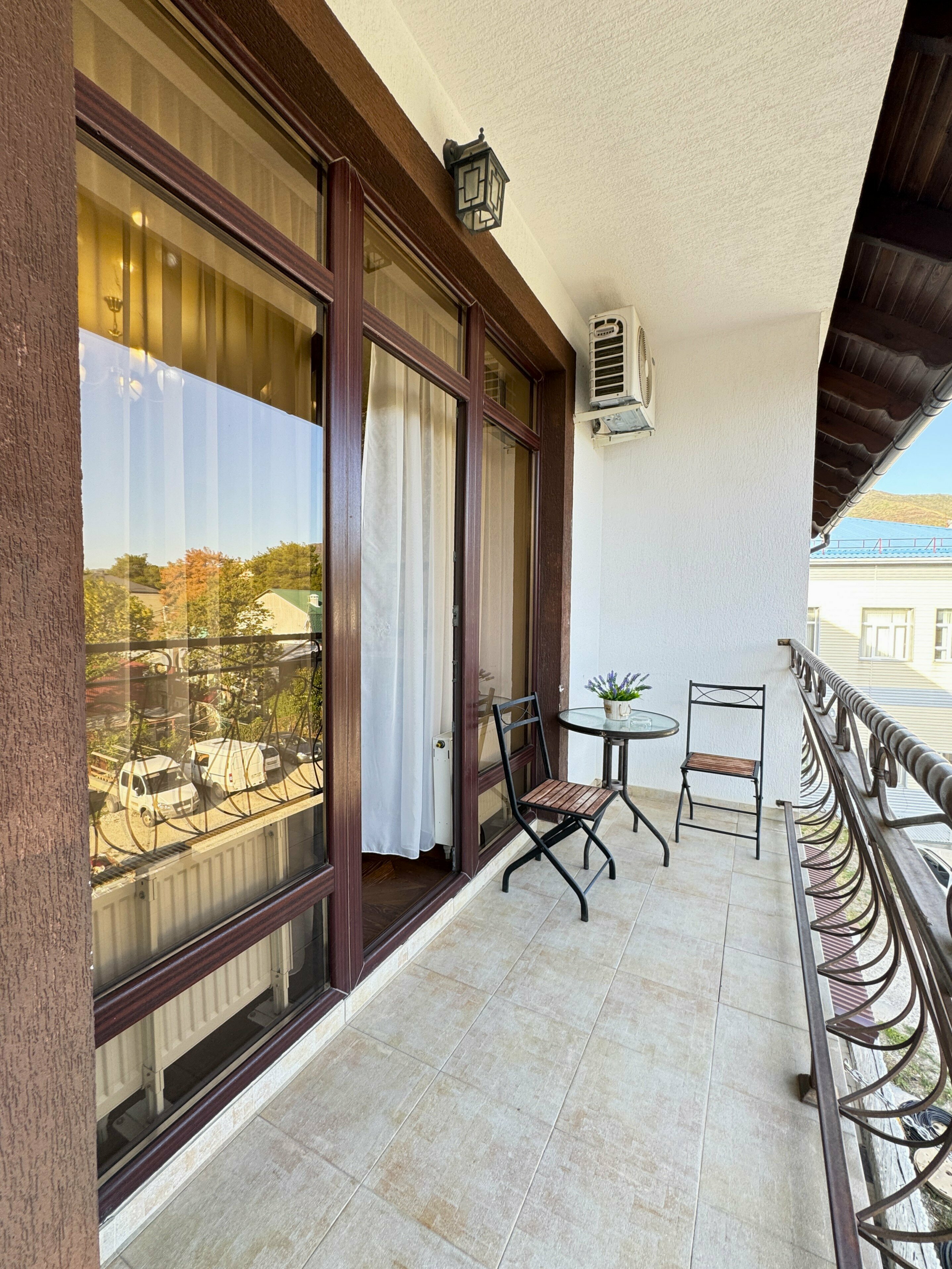 Deluxe двухместный с балконом, вид на город, с доп местом