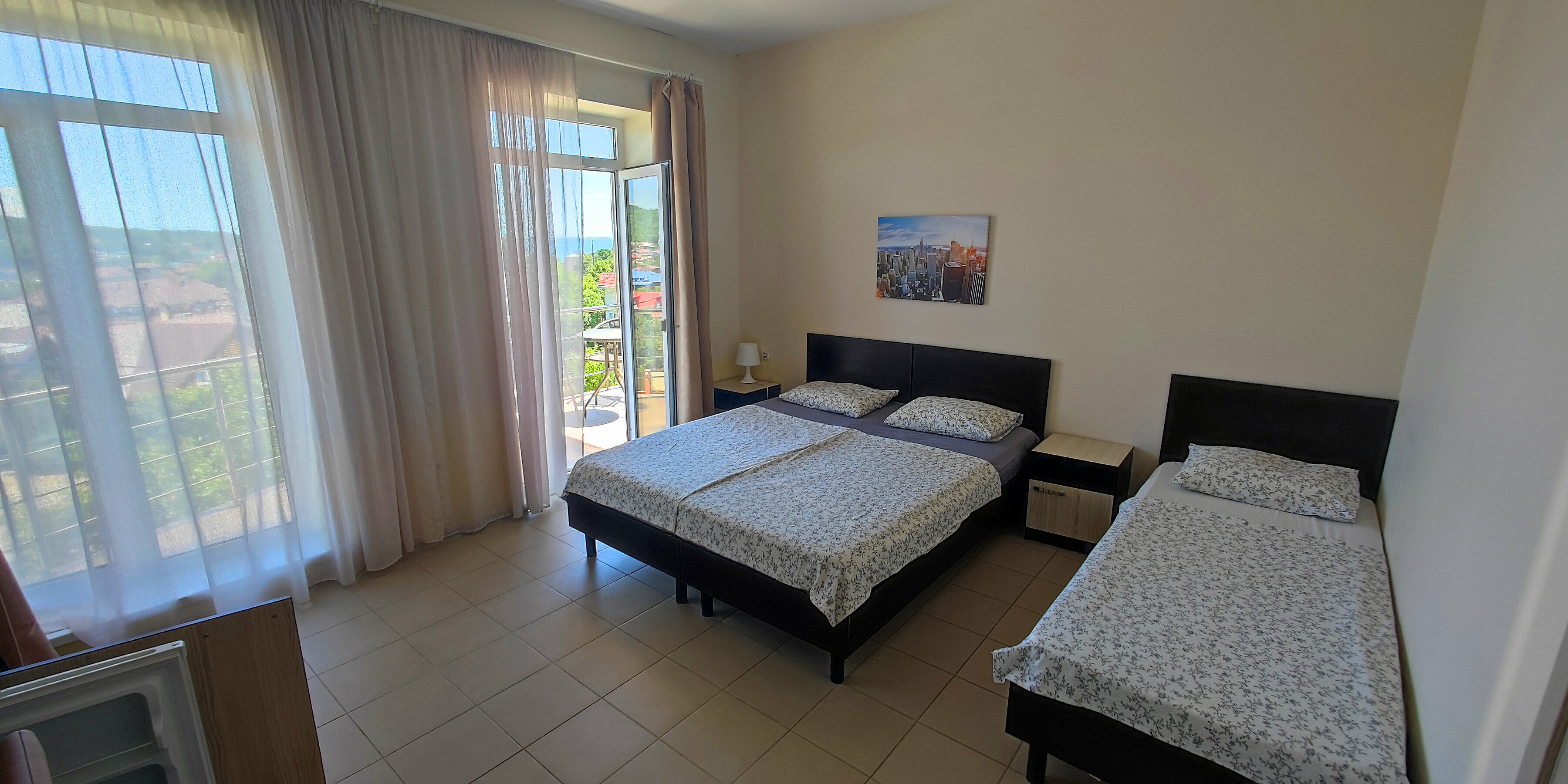 Трехместный номер с балконом