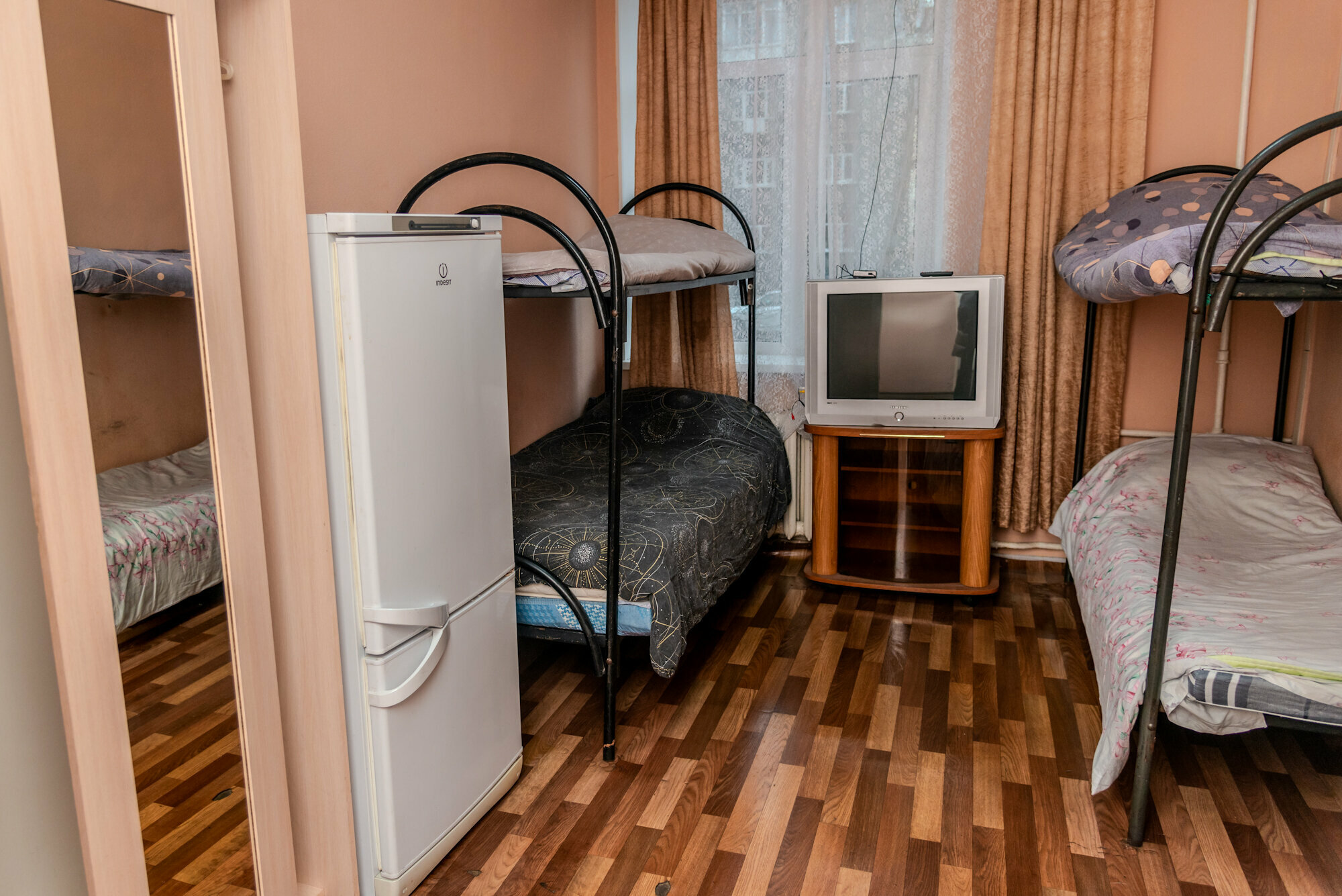 Кровать в общем номере с 4 кроватями