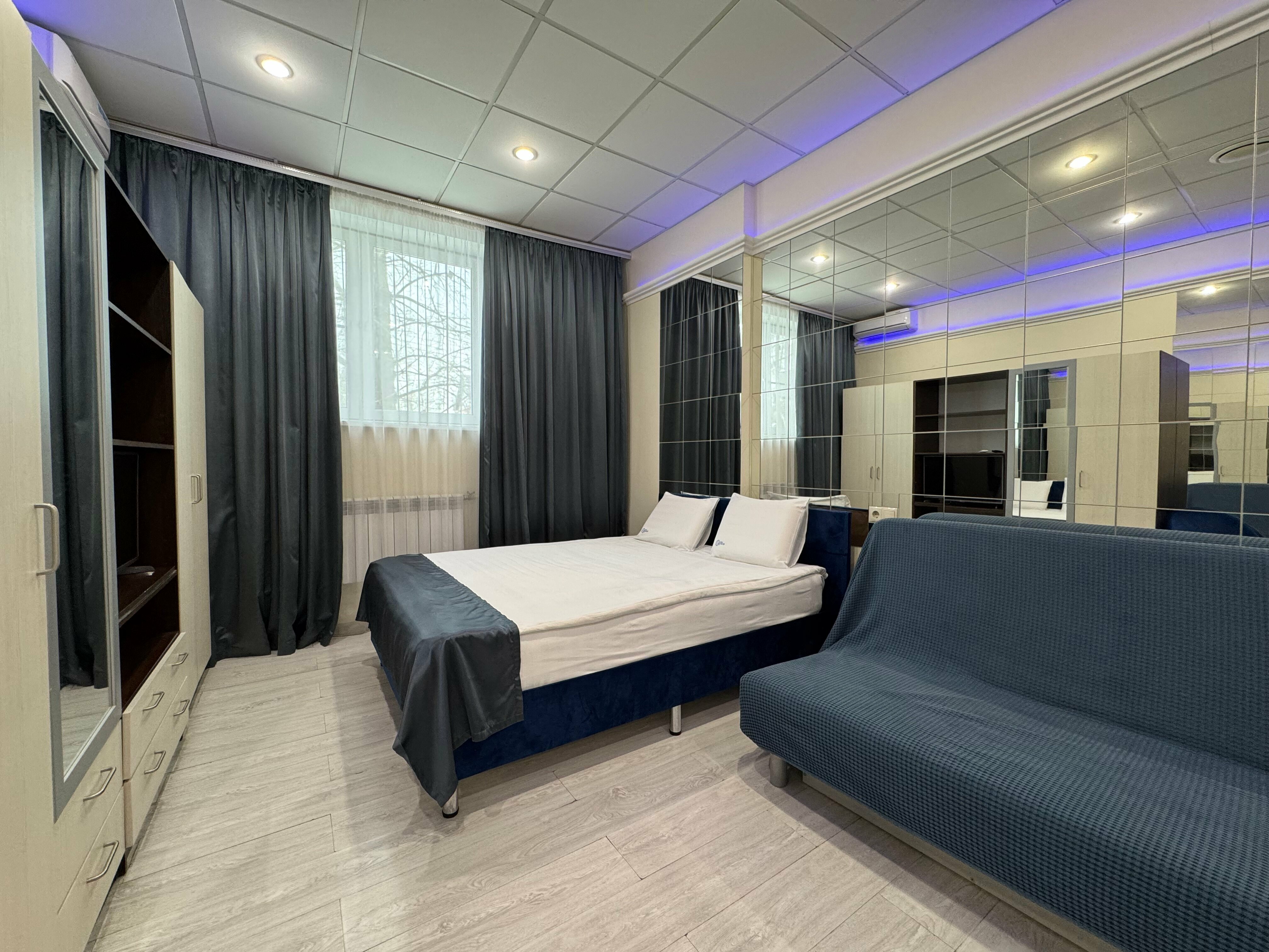 Трехместный номер Делюкс