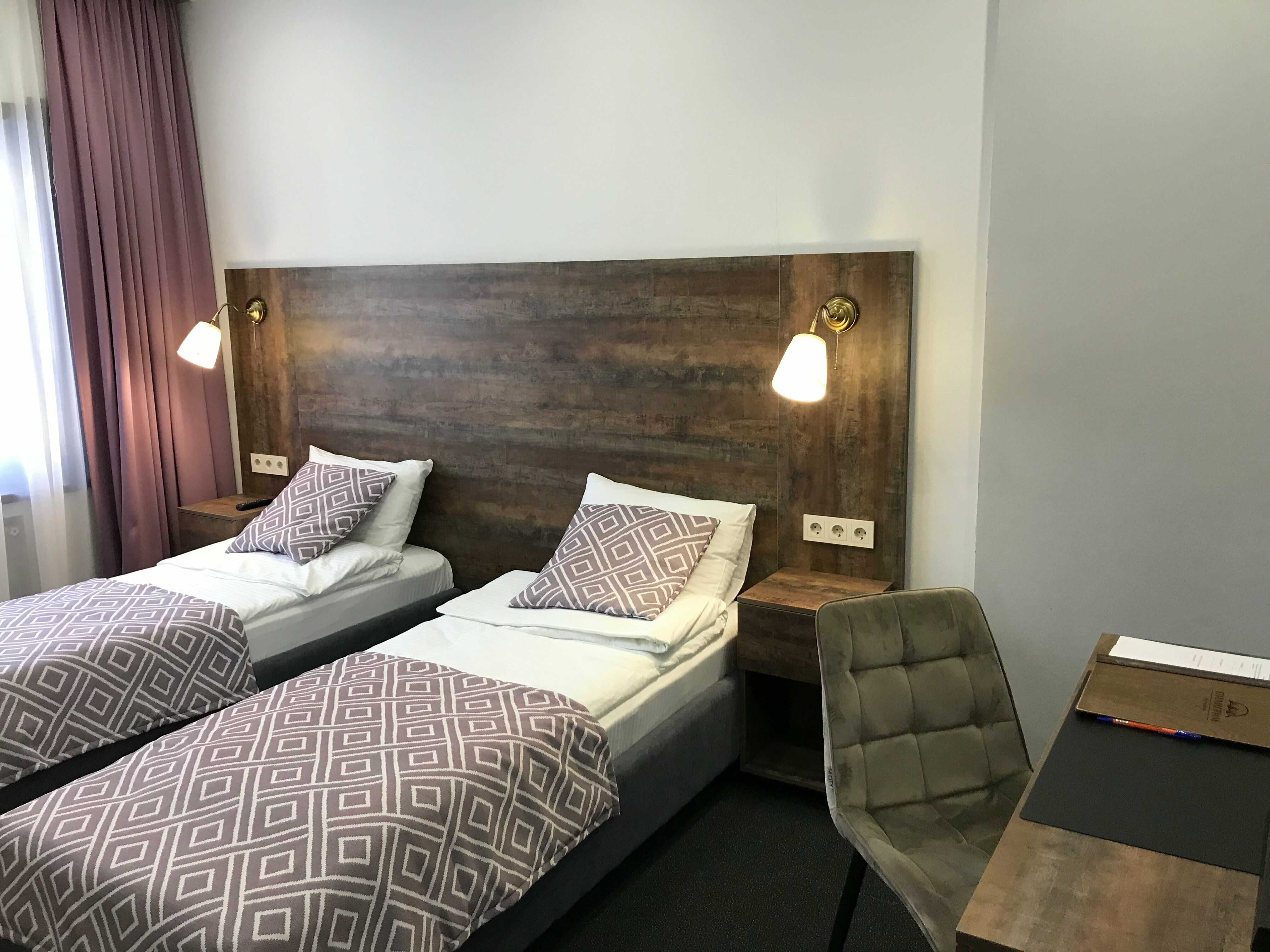 Улучшенный двухместный номер с 2 отдельными кроватями