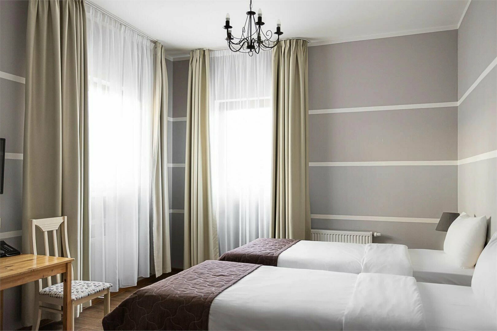 СТАНДАРТ С ДВУМЯ РАЗДЕЛЬНЫМИ КРОВАТЯМИ