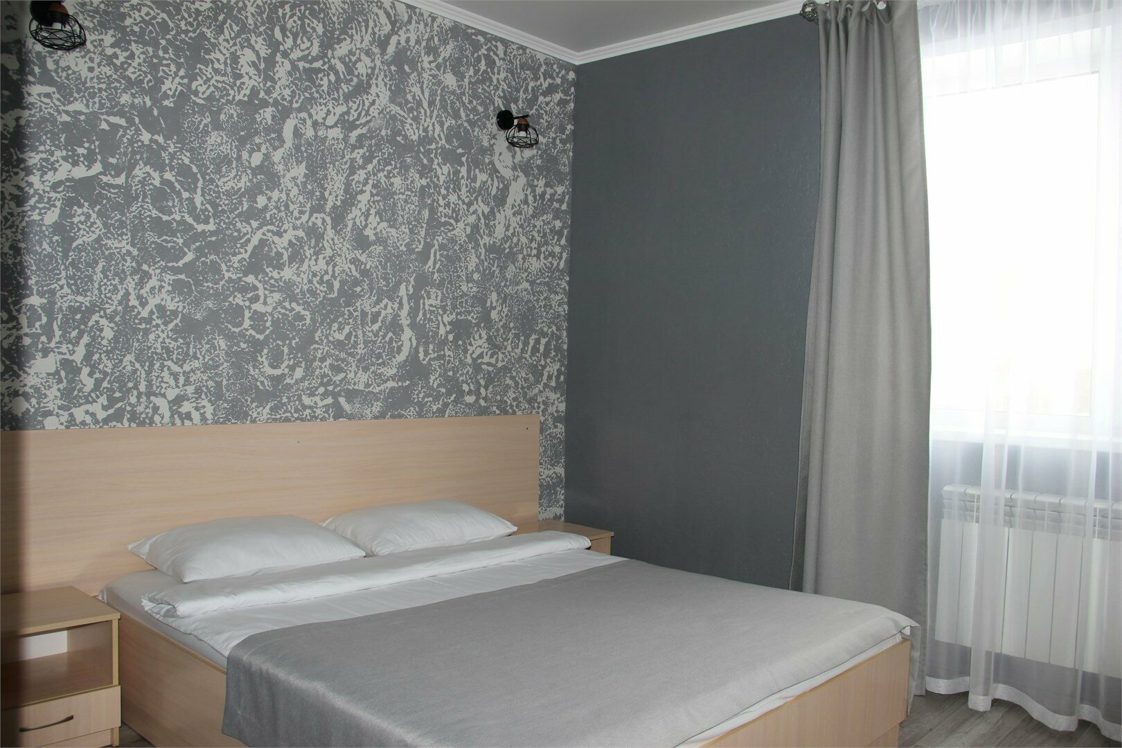 Номер стандарт с одной большой кроватью