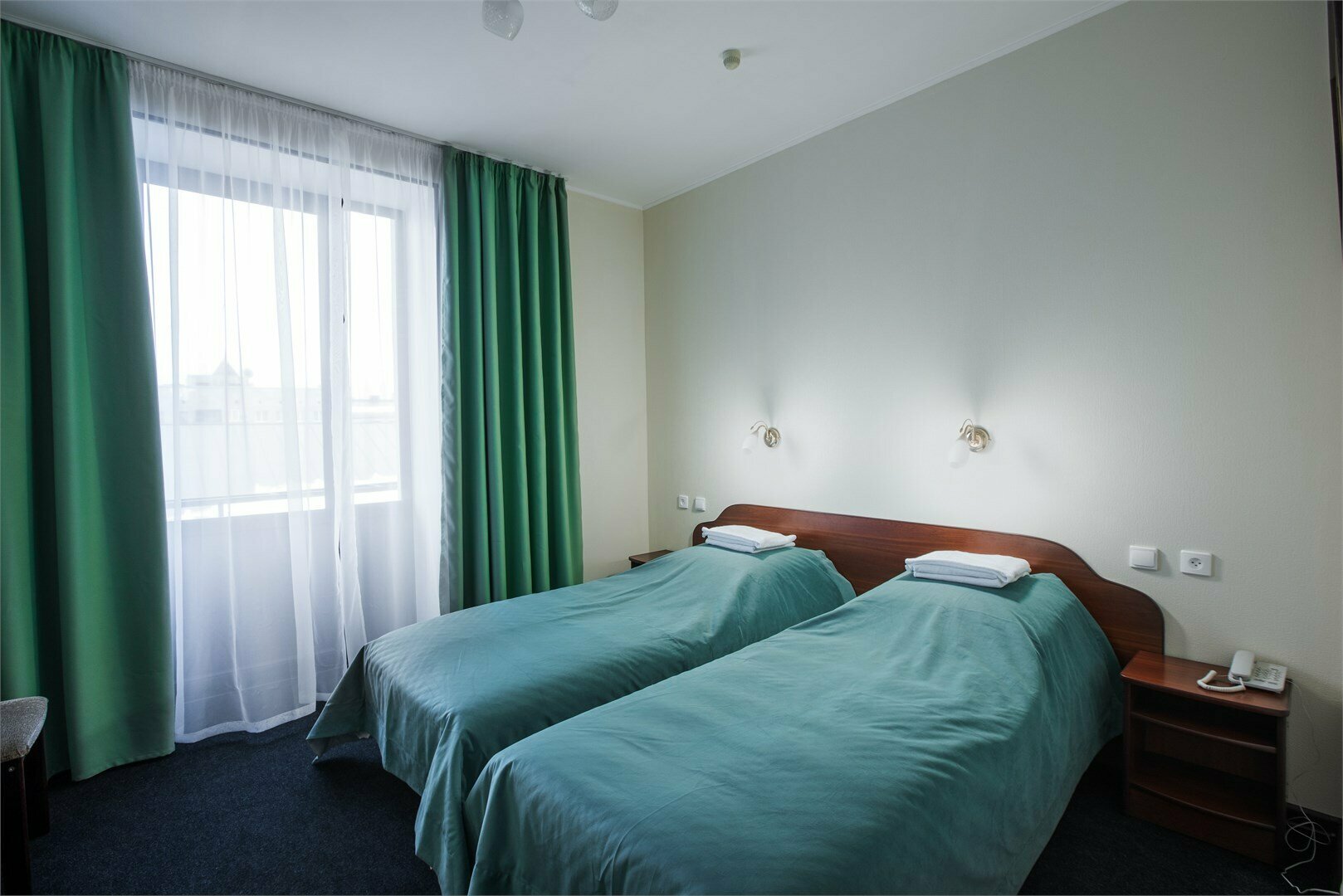 Двухместный номер эконом-класса с 2 отдельными кроватями