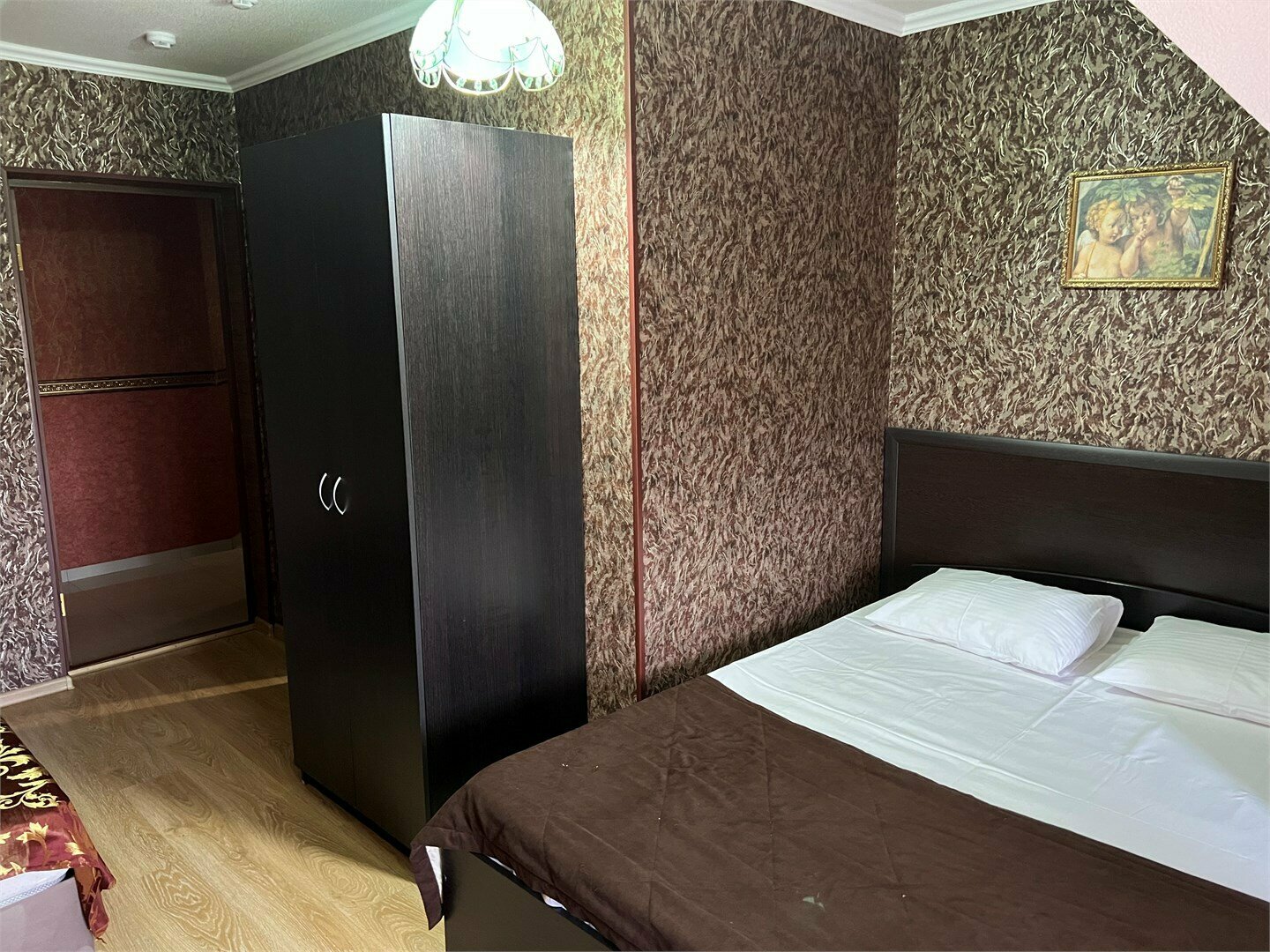 Стандартный двухместный номер с дополнительным местом