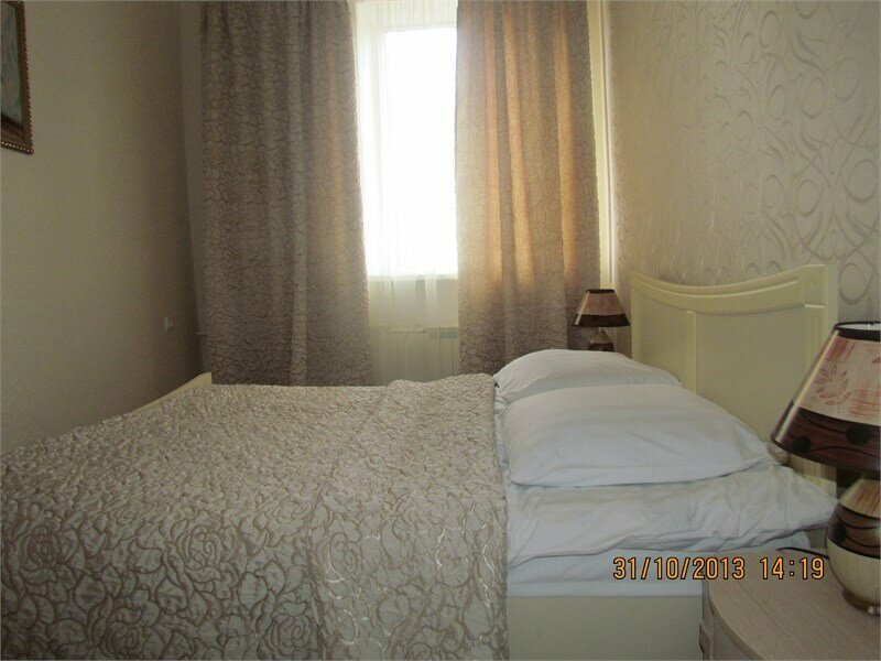 Двухместный номер с двуспальной кроватью и дополнительной кроватью