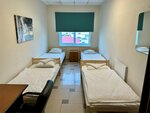 Четырёхместная комната с 4 односпальными кроватями в Невский