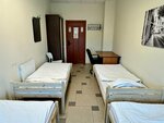 Четырёхместная комната с 4 односпальными кроватями в Невский
