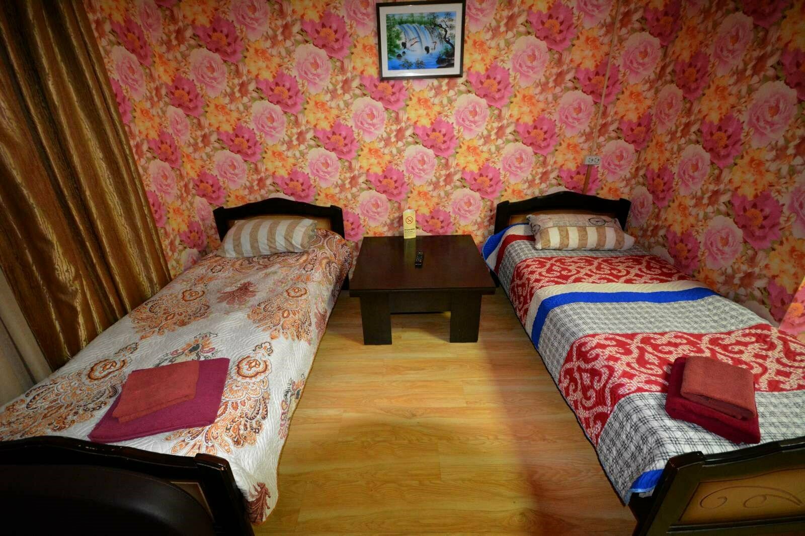 Двухместный номер с 2 отдельными кроватями и душем