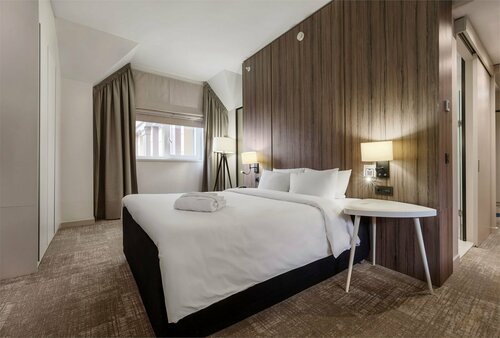 Номер Suite с двуспальной кроватью и диван-кроватью в Mercure Воронеж Центр