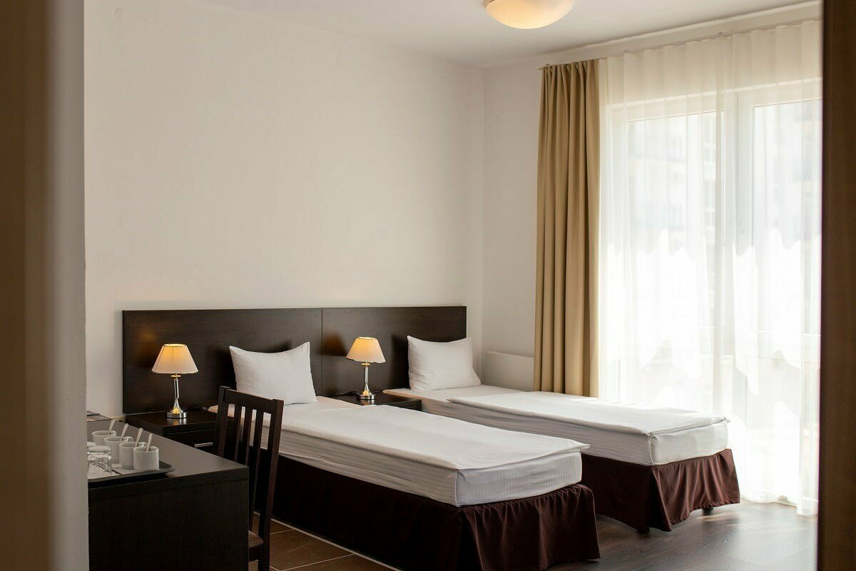 Двухкомнатный номер без кухни с четырьмя кроватями кроватями