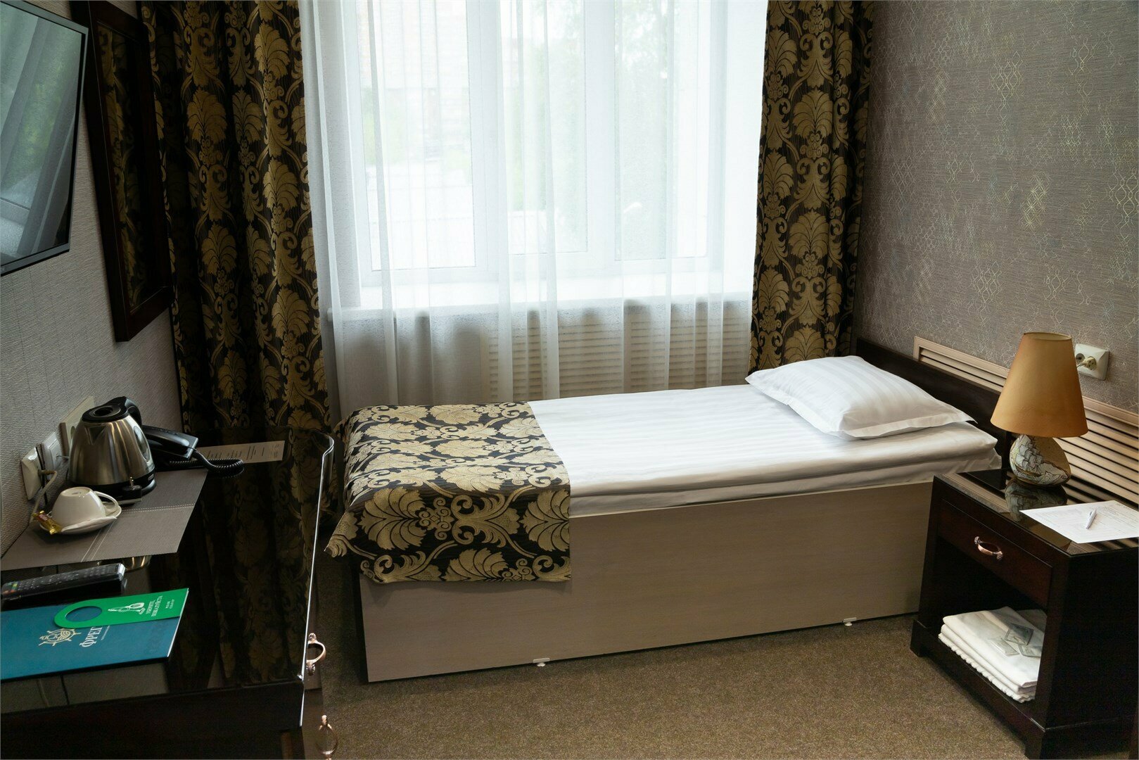 Одноместный номер с общей ванной комнатой