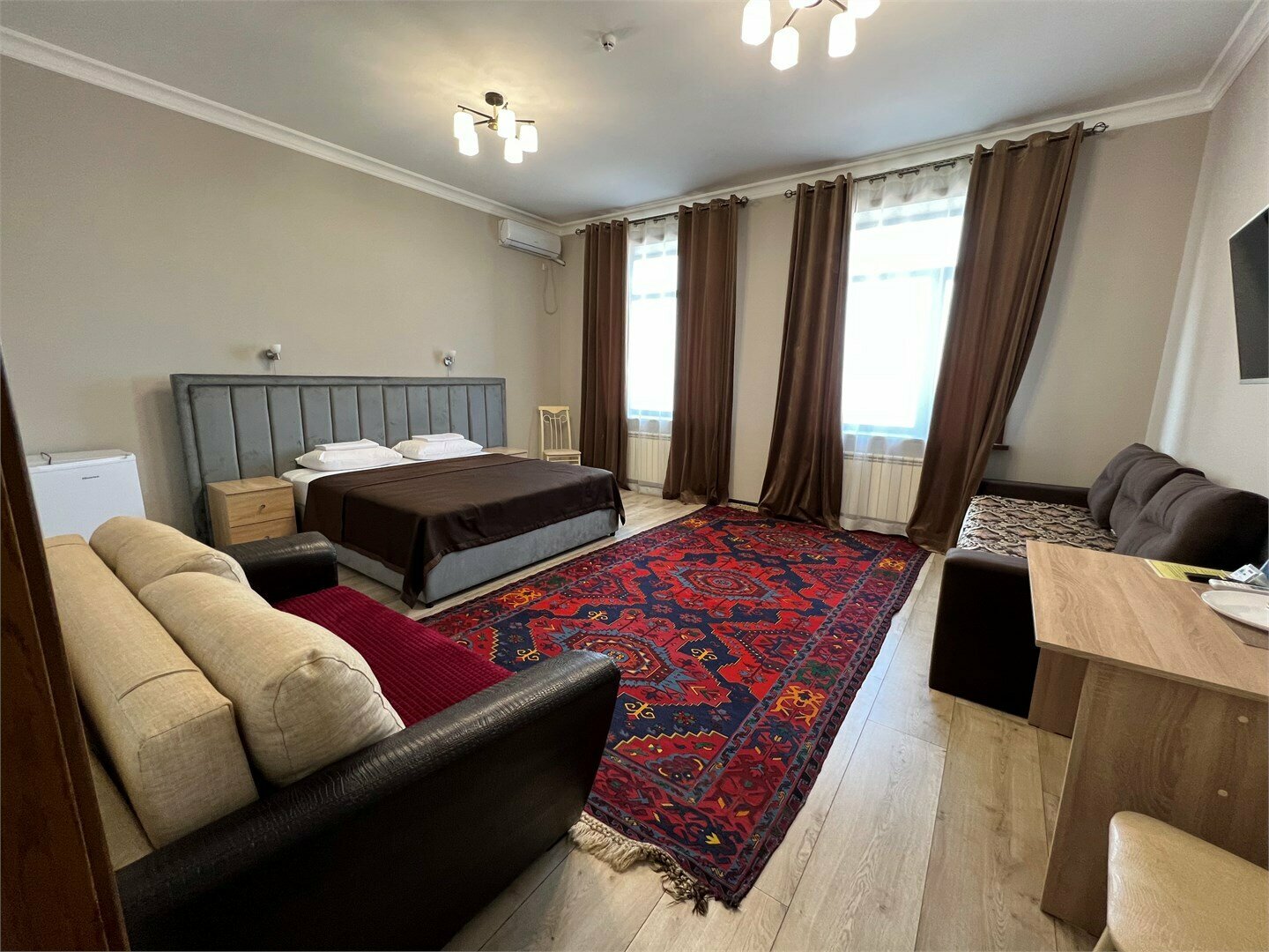 ПРОСТОРНЫЙ НОМЕР КЛАССА ДЕЛЮКС С ВИДОМ НА МОРЕ И БАЛКОНОМ