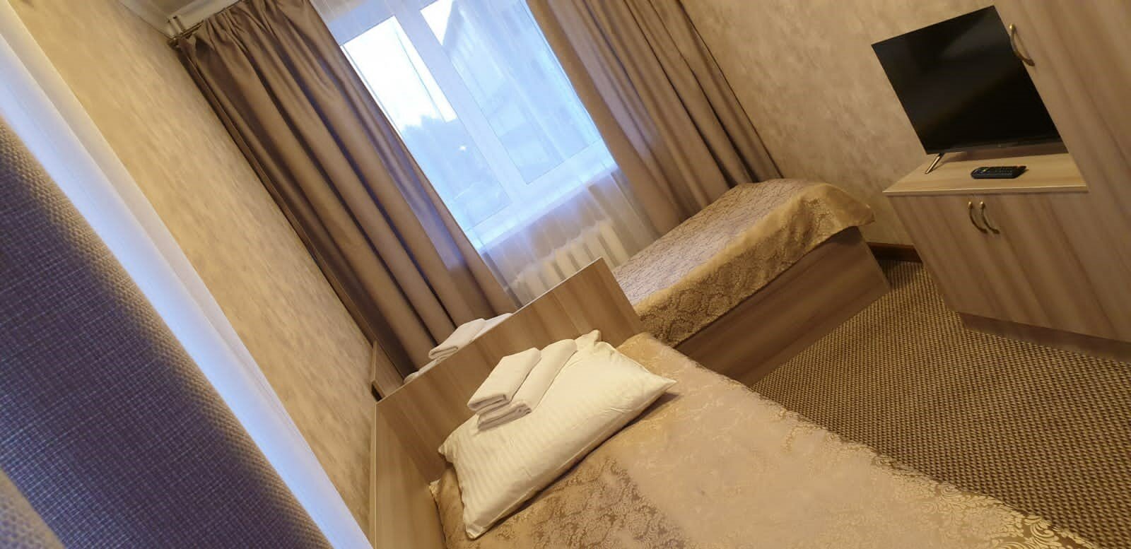 Двухместный номер эконом-класса с 2 отдельными кроватями