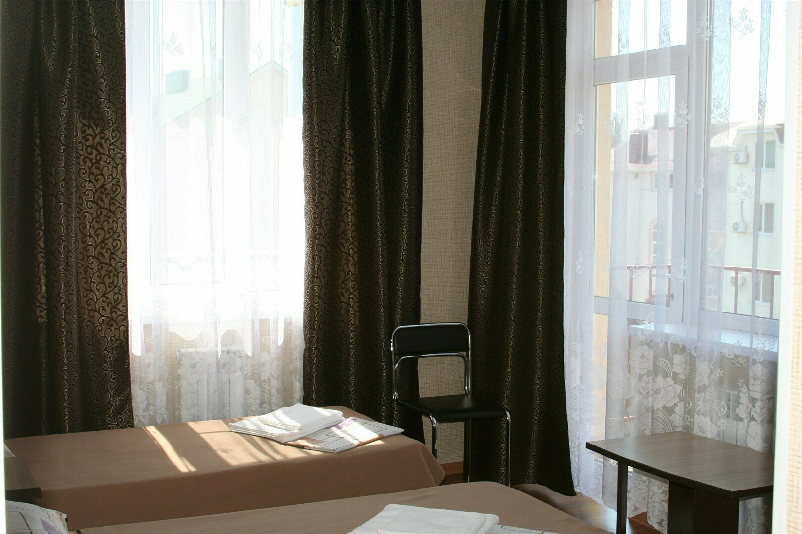 Трехместный номер с балконом