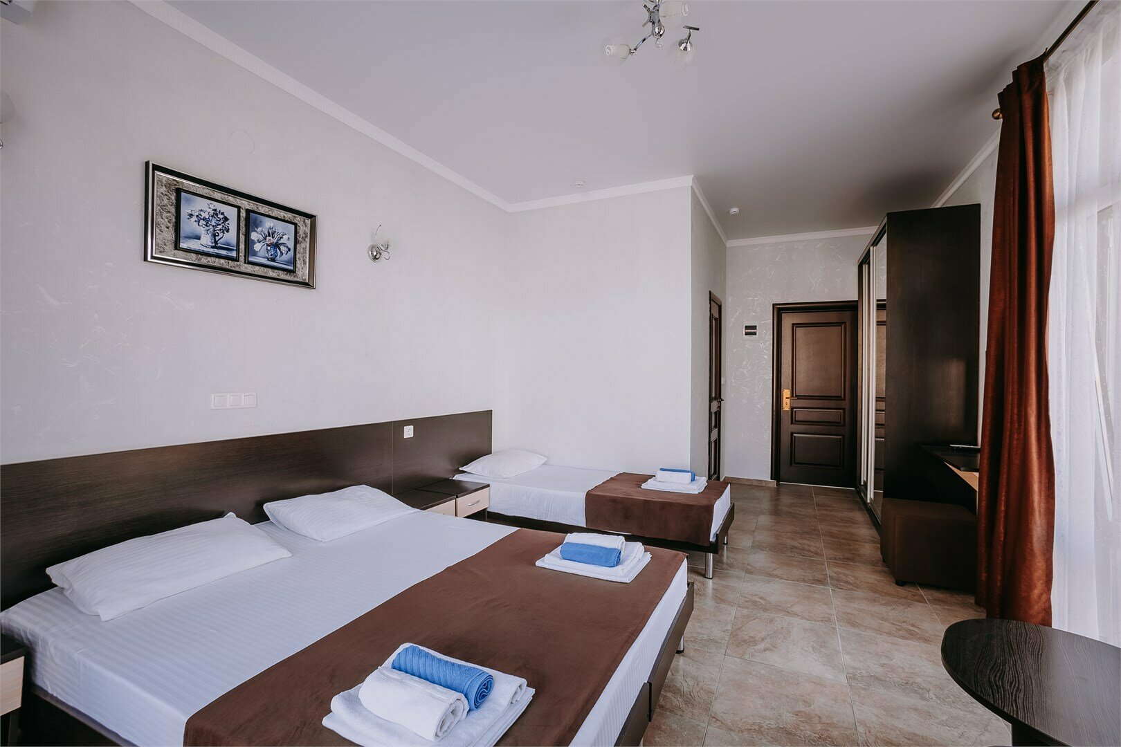 Четырехместный номер (3+1) с балконом