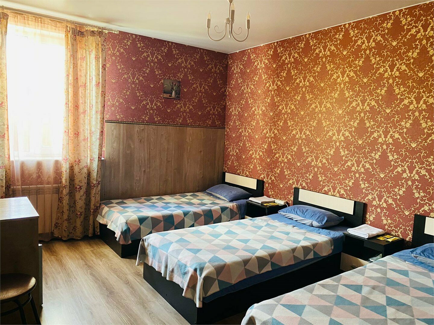 Улучшенный трехместный номер