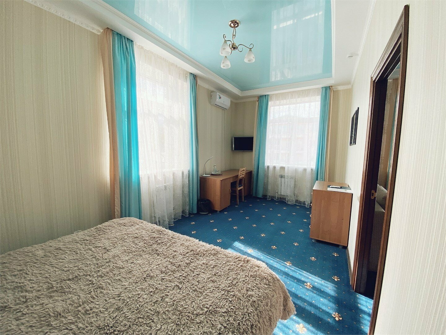 Четырехместный номер Делюкс