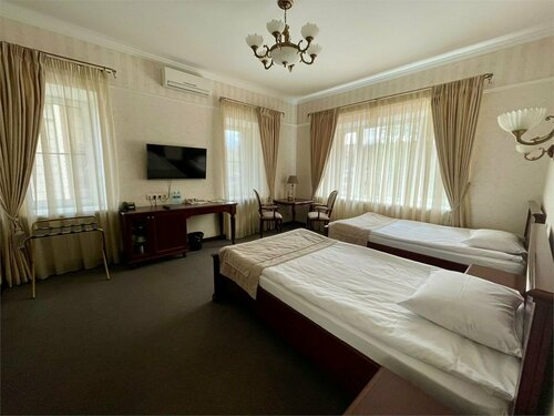 Улучшенный двухместный номер с 2 отдельными кроватями