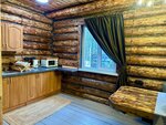 Дом из сруба с камином в Лесная сказка