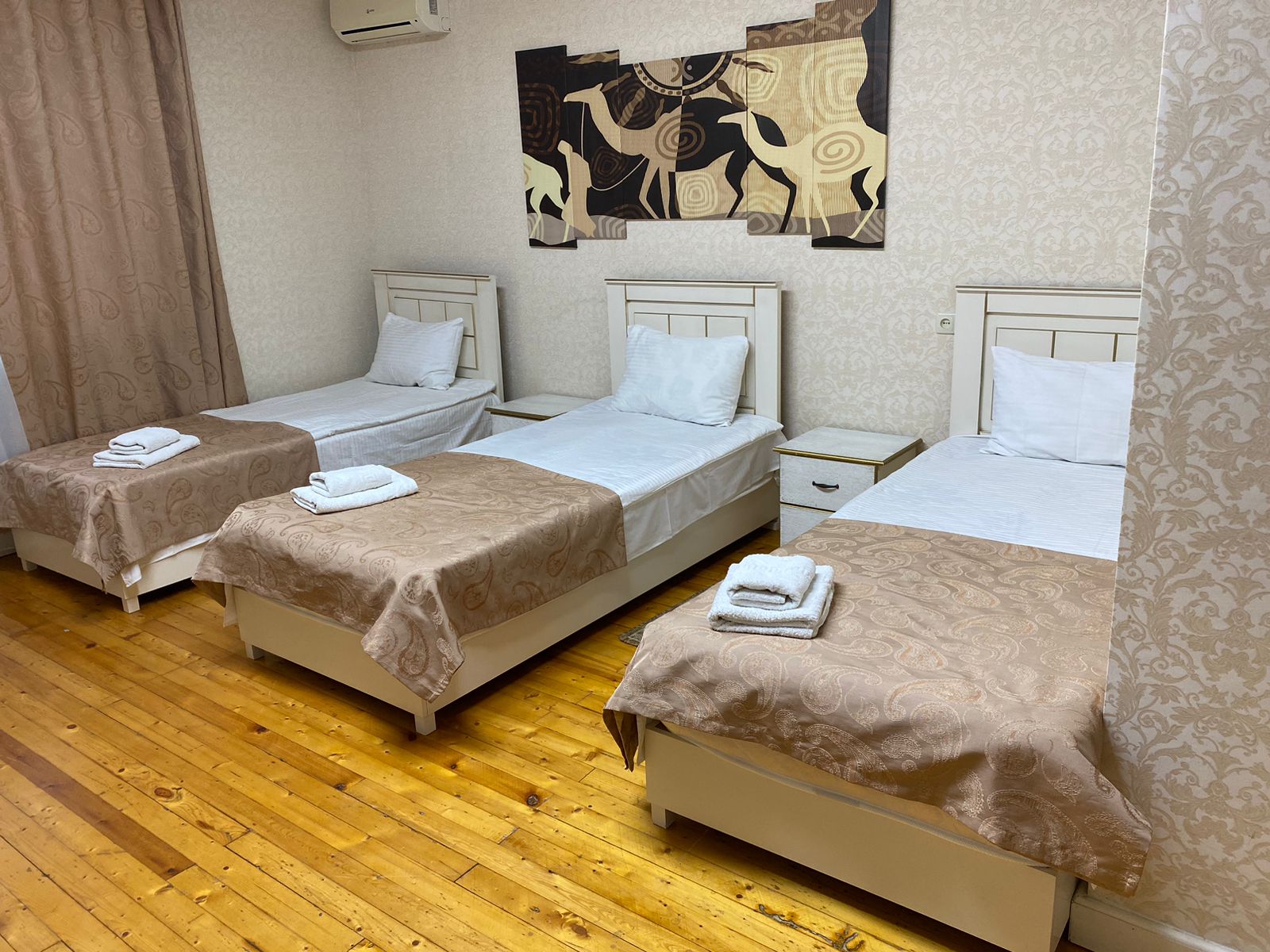 Трехместный номер с балконом