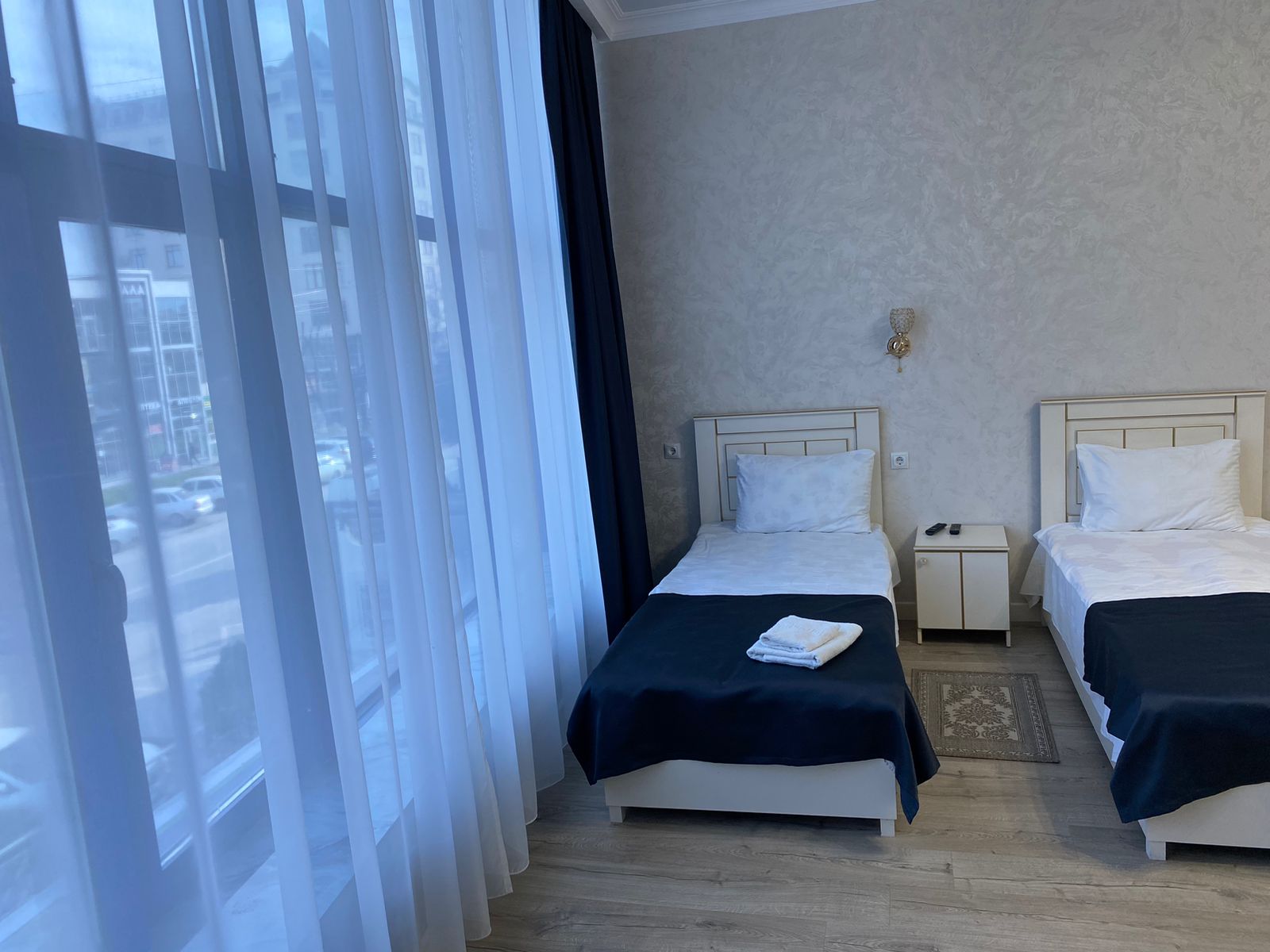 Трехместный номер с собственной ванной комнатой