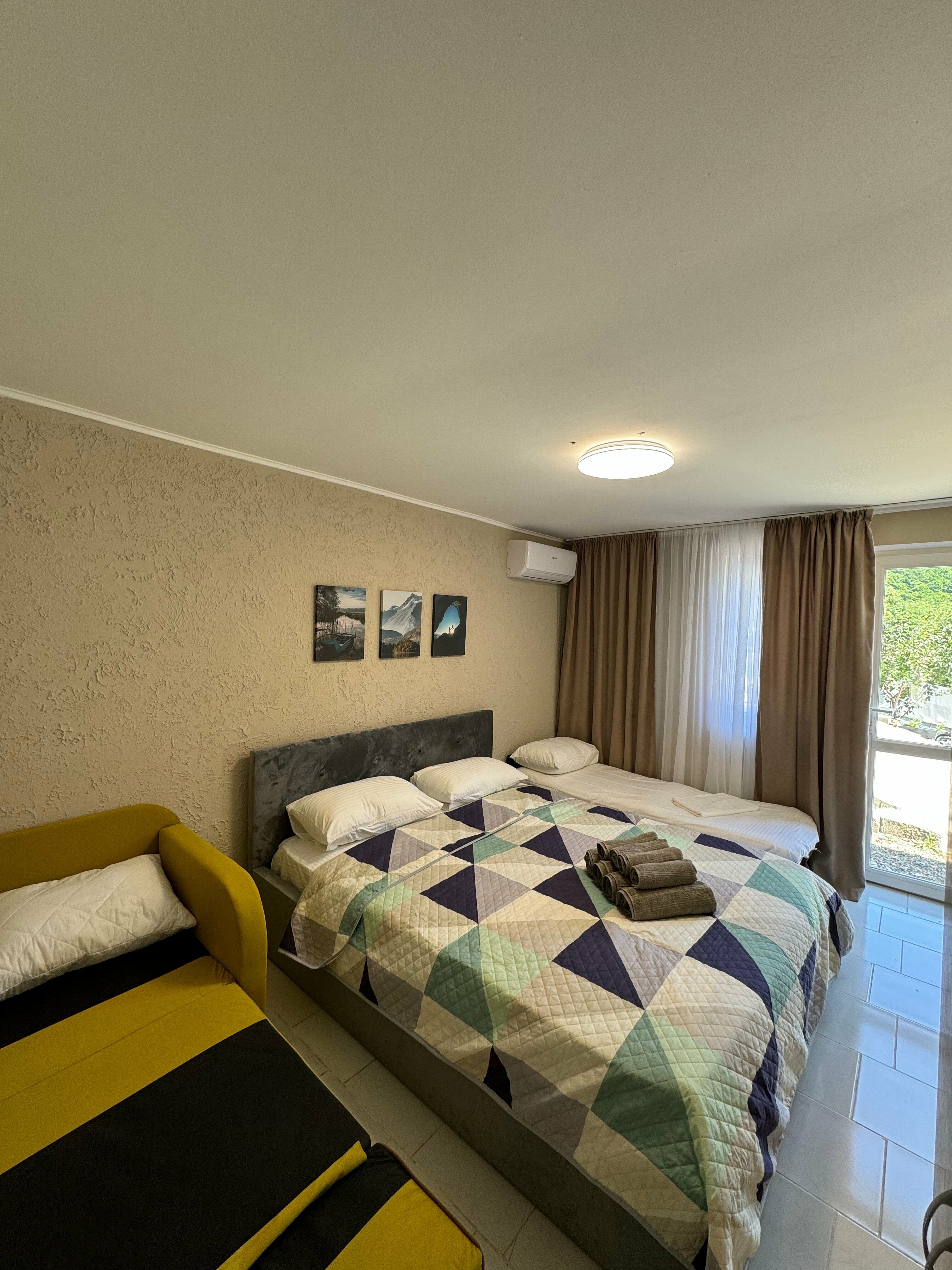 Улучшенный 4х местный номер с  удобствами .