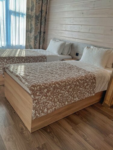 Улучшенный двухместный номер с 2 отдельными кроватями