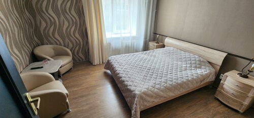 Номер улучшенный с 1 двуспальной кроватью в Унисон