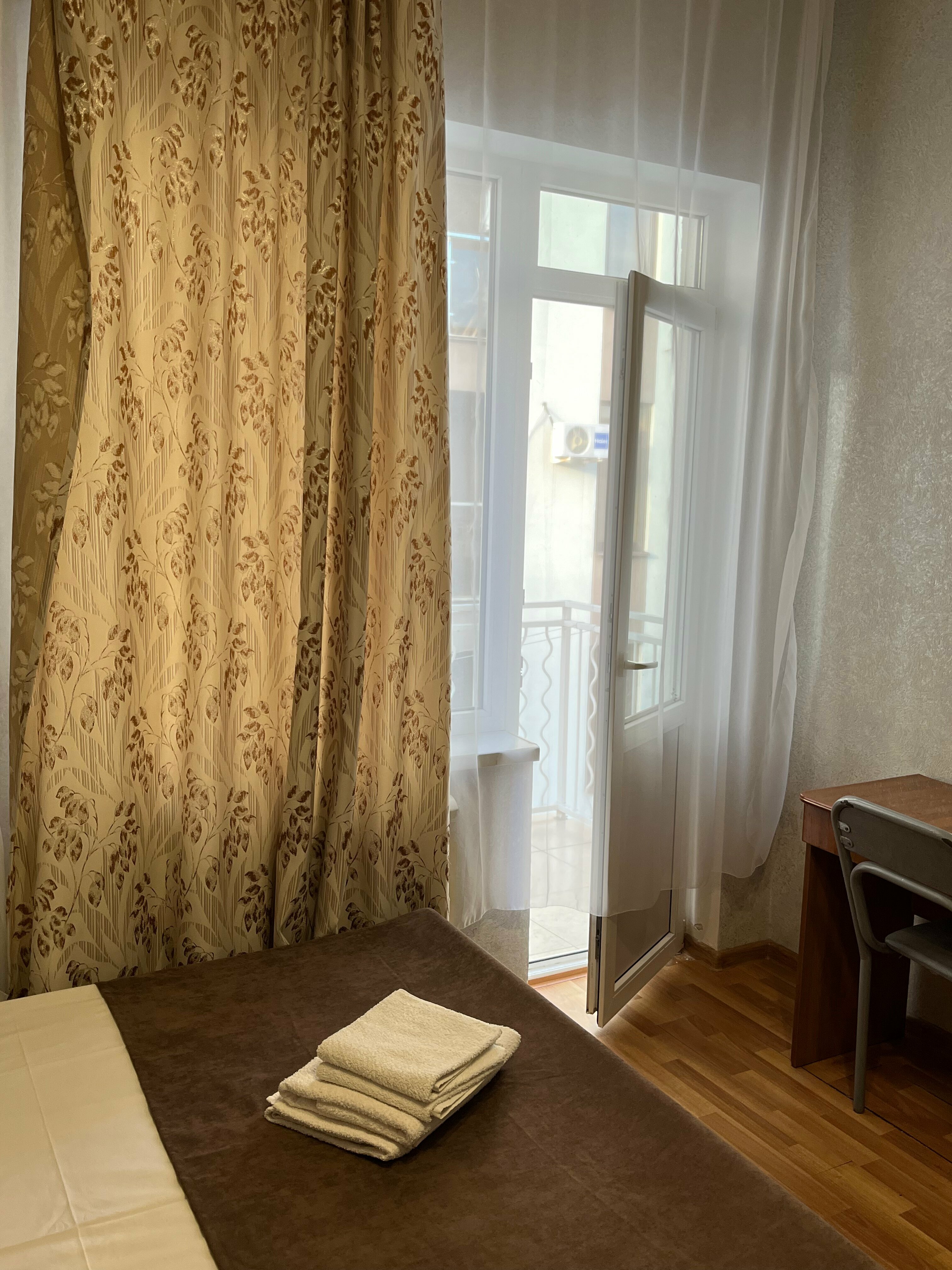 Трехместный номер с балконом