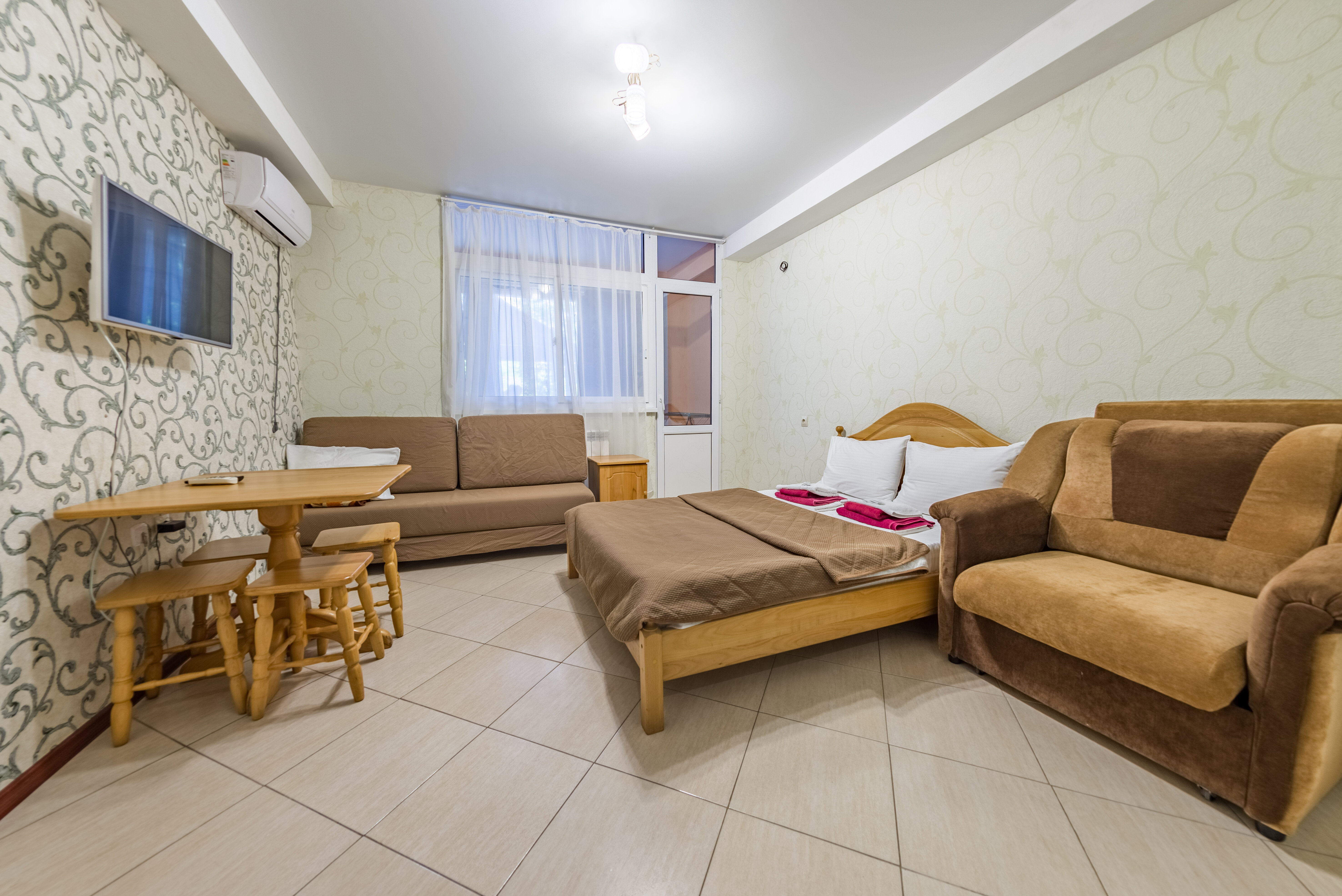 Четырехместный номер с видом на сад