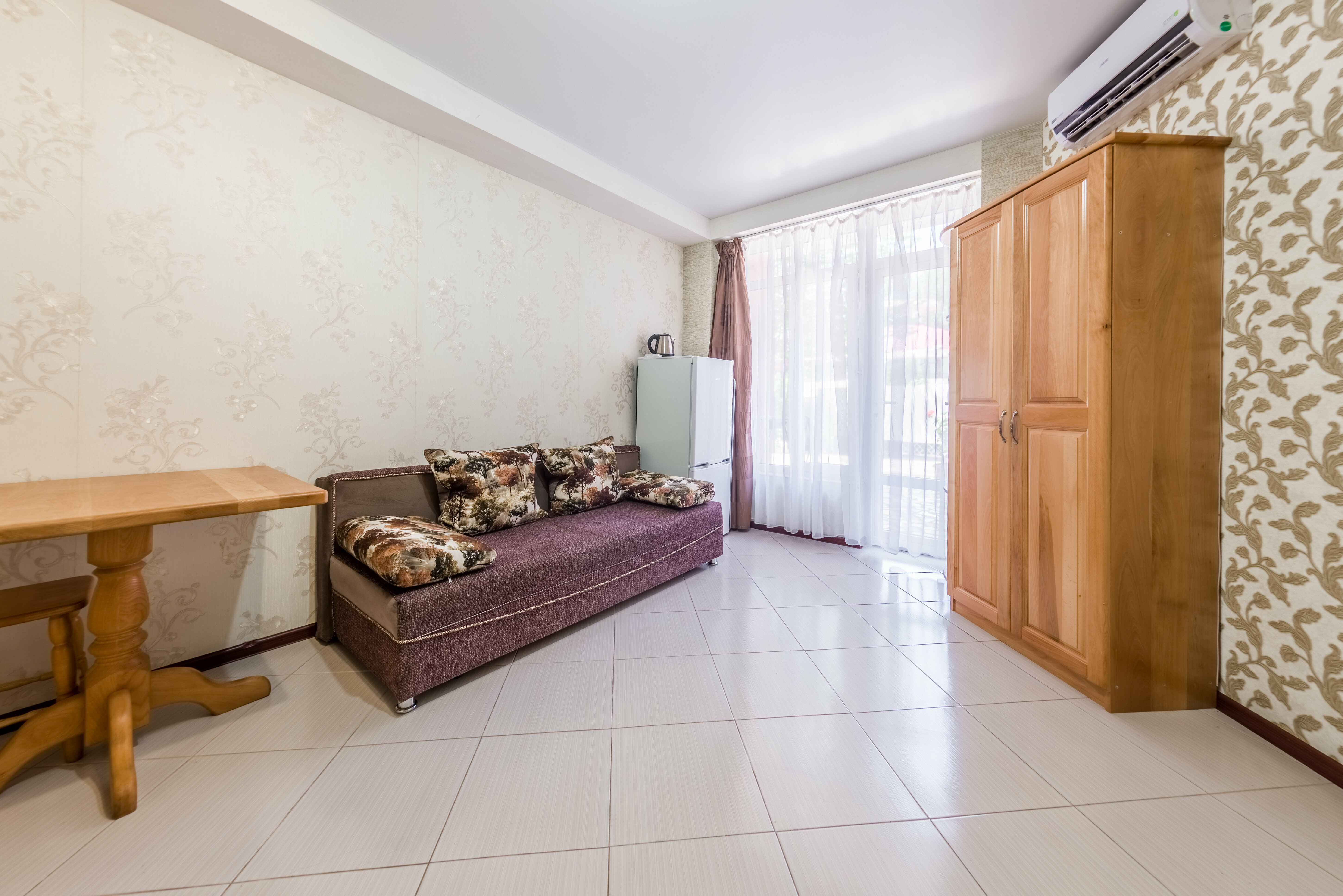 Четырехместный номер с видом на сад