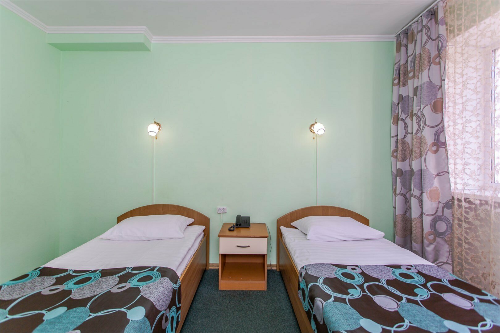 Двухместный номер эконом-класса с 2 отдельными кроватями