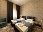 Улучшенный двухместный номер с 2 отдельными кроватями в Сова