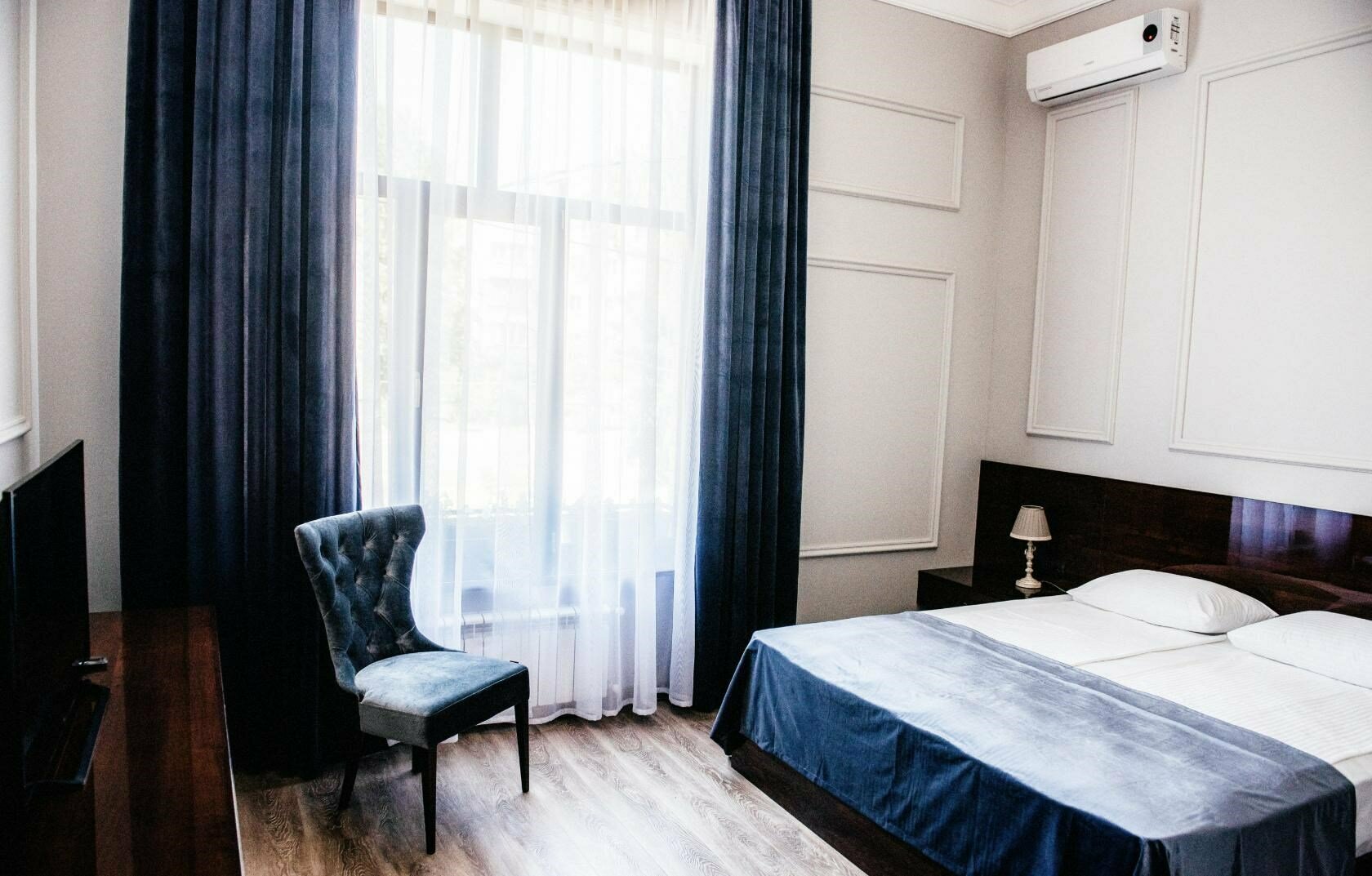 Номер Де Люкс с кроватью размера KING SIZE