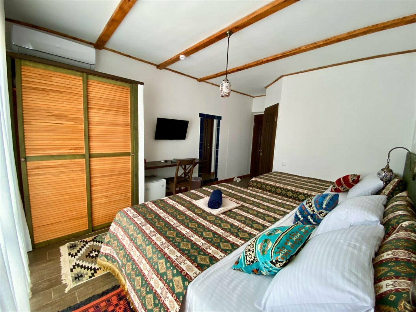 Трехместный номер с балконом