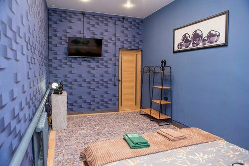 Двухместный номер с двуспальной кроватью и дополнительной кроватью